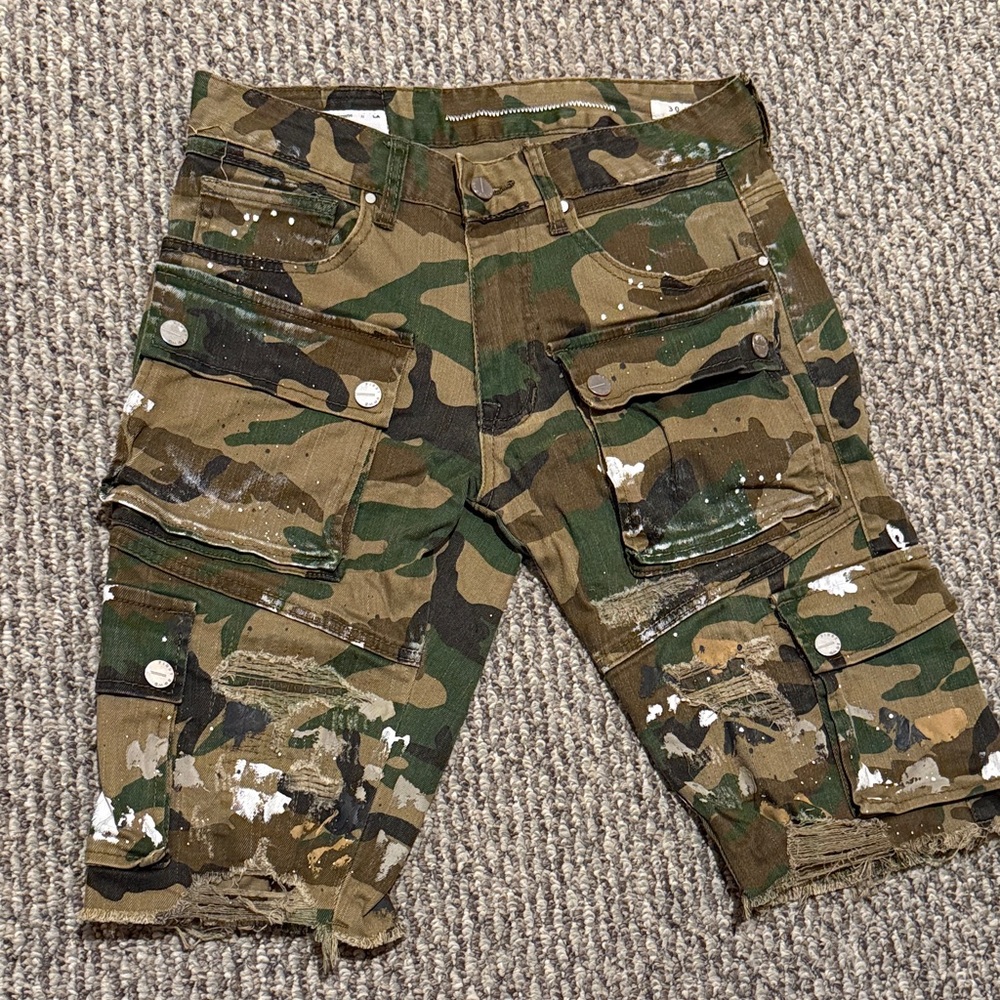 First row camo distressed paint shorts
